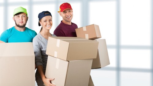 Local Stockwell movers loading a van for house relocation