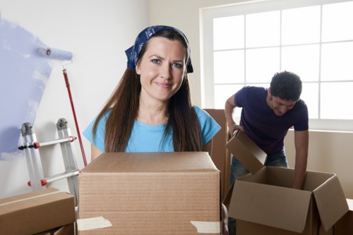 Assorted packing supplies including tape, wrap, and cartons for Stockwell moves