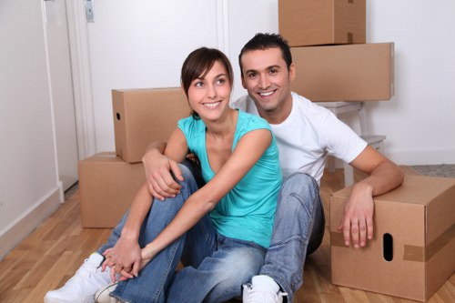 Loading furniture into a removal truck in Stockwell