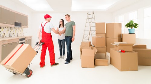 House removals service unloading belongings at a Stockwell home