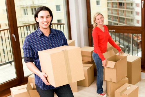 Moving boxes and furniture in a Stockwell flat relocation