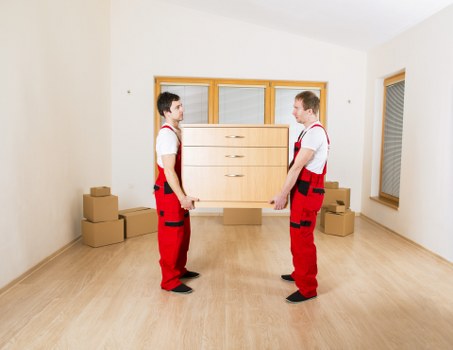Trained staff handling furniture with care during removals
